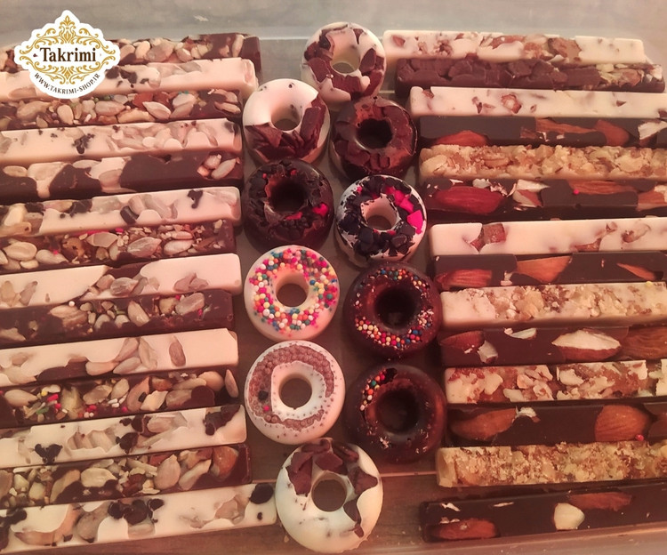 شکلات کاکائویی مغزدار ( 310 گرمی ) مغز دار ترکیبی سیگاری و گرد ( بادام هندی ،بادام ، فندق ، پسته ، گردو ، مغز تخمه )